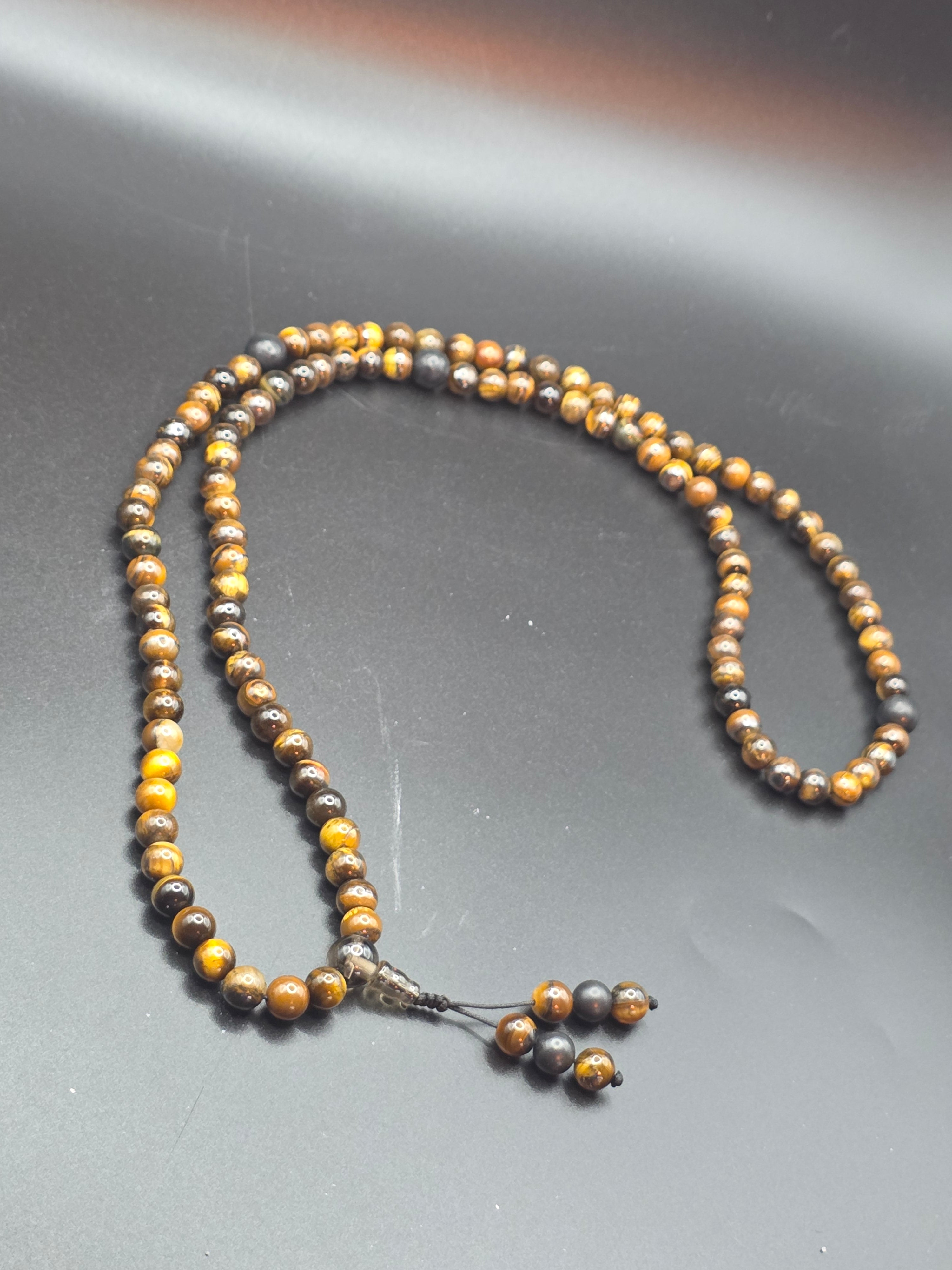 Tiger's Eye and Shungite Adjustable Mala 108-bead  Energetic Focus: Confidence, grounding, protection.